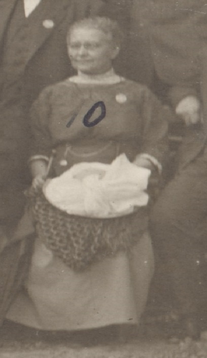 The number 10 written on a sepia blurred photograph of a woman.