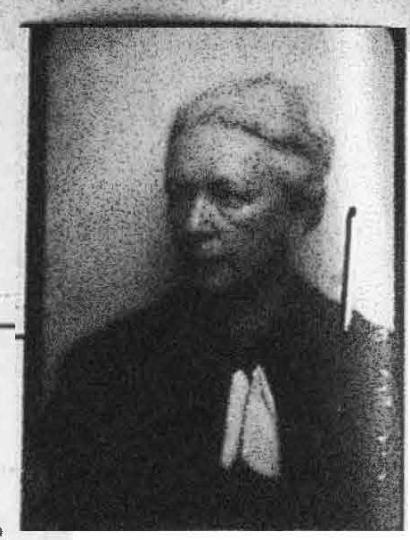 Grainy black and white photograph of a white woman from the early 1900s.