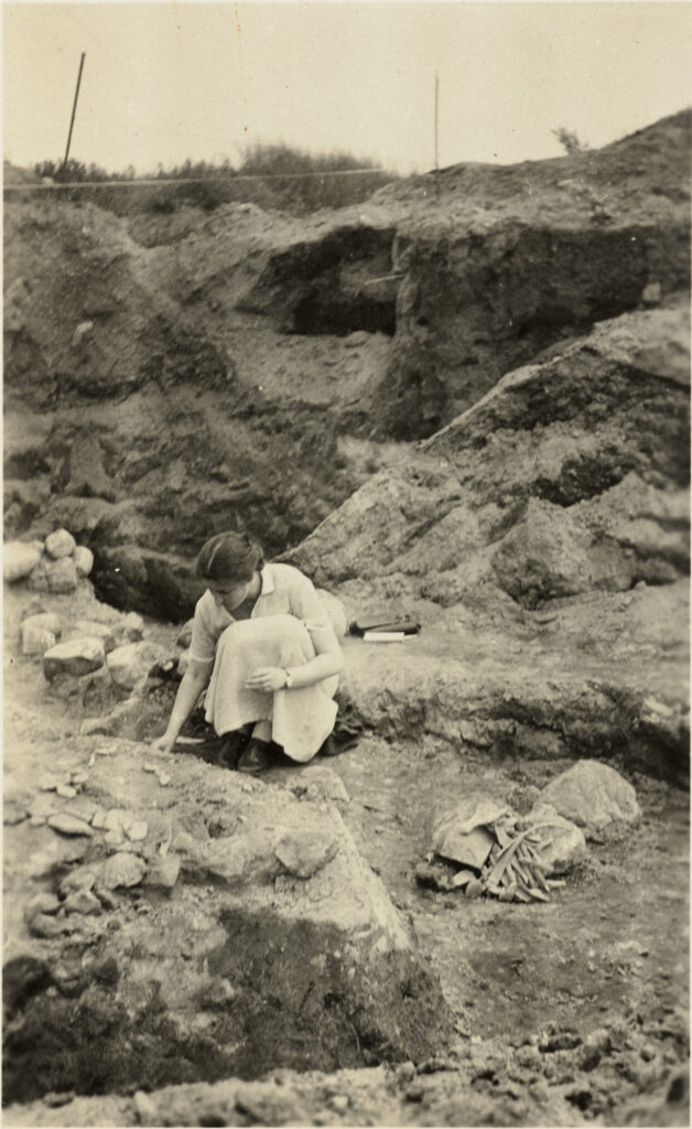 Sepia images of a woman crouched down on an excavation site.